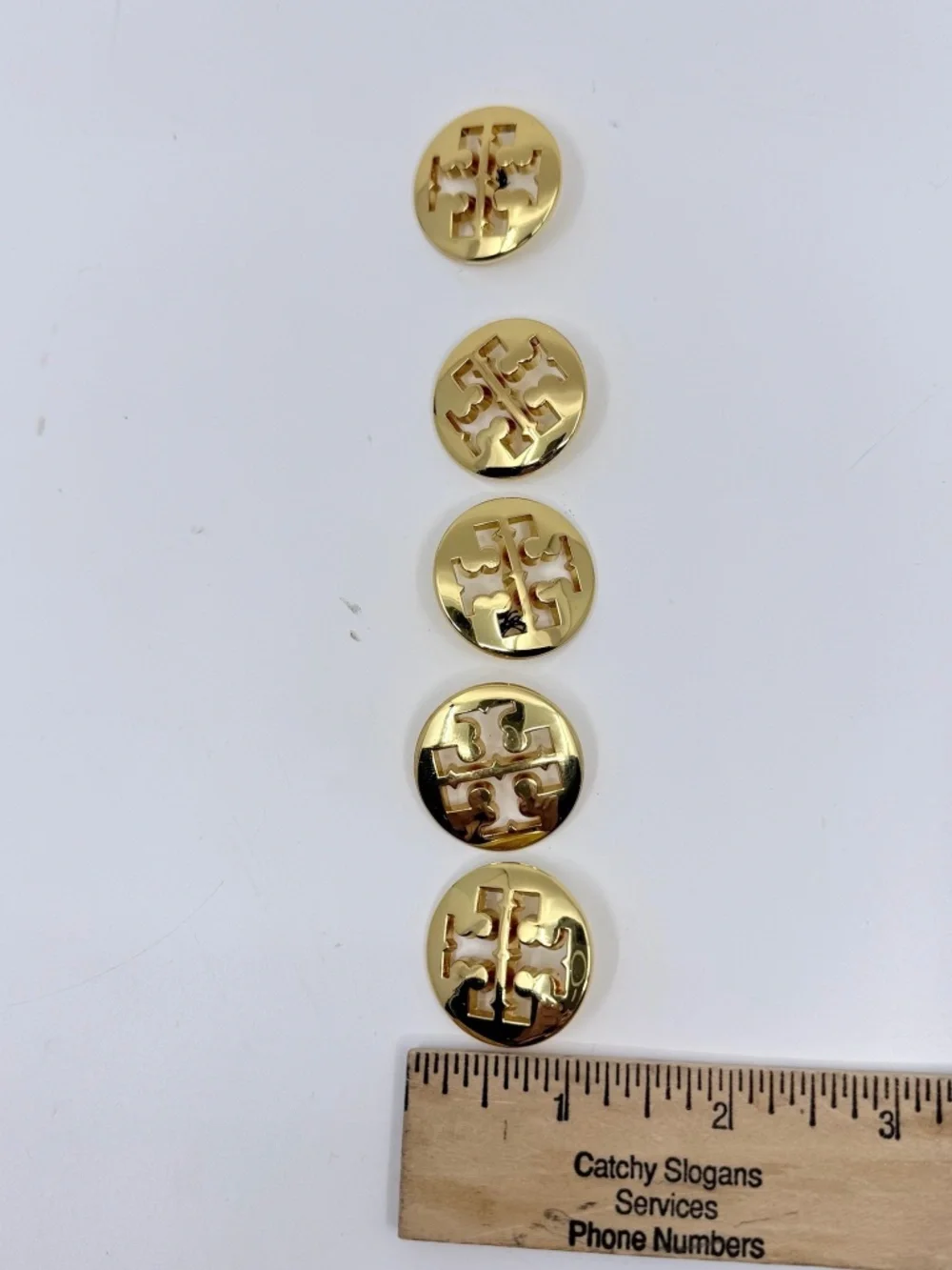 Five Gold Finish Tory Burch Buttons